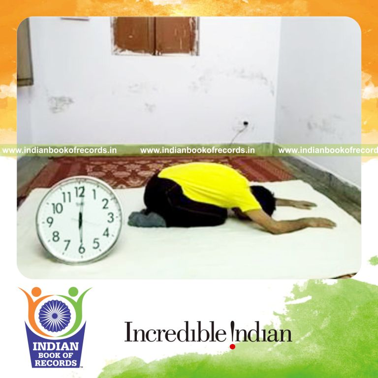 individual holding hare yoga pose for longest duration for record in Indian Book of Records