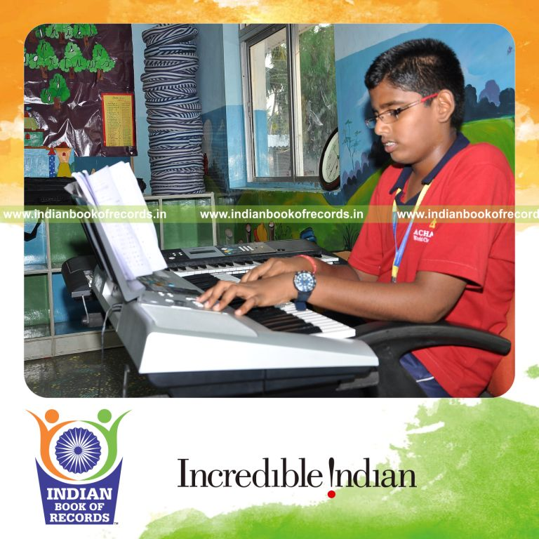 young male performing extended keyboard concert for record in Indian Book of Records