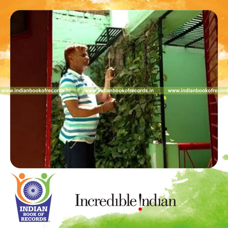 individual balancing knitting needle on thumb for longest duration for record in Indian Book of Records