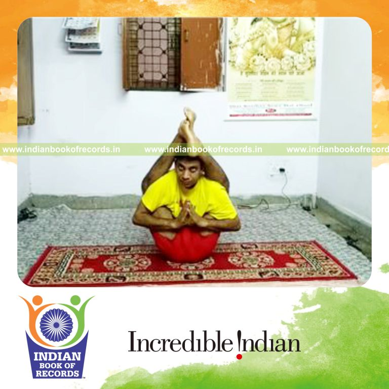 individual holding legs behind head yoga pose for longest time for record in Indian Book of Records