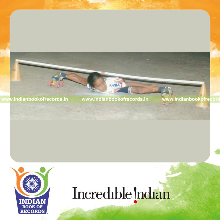 young female performing limbo skating for extended duration for record in Indian Book of Records