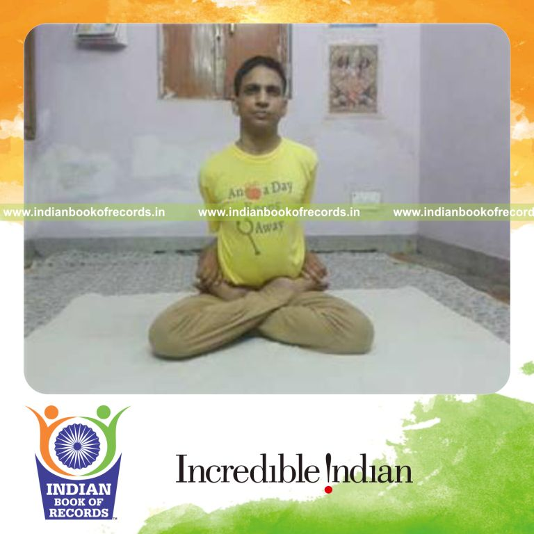 individual holding locked lotus yoga pose for longest duration for record in Indian Book of Records