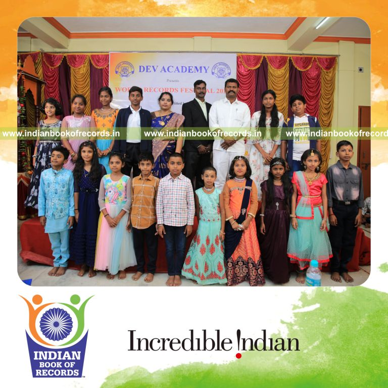 Team participating in a relay solving addition and subtraction problems continuously for Indian Book of Records