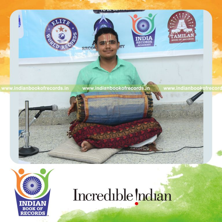 An extended mridangam concert performance held over many hours for Indian Book of Records