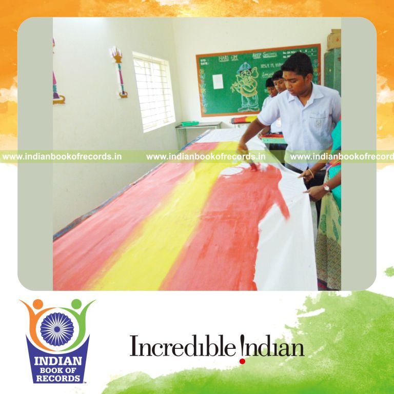 minor male creating longest painting artwork for Indian Book of Records