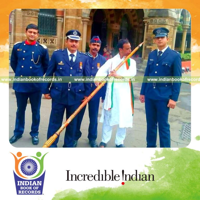 Exceptionally long bamboo flute crafted and played to demonstrate functionality recognized by Indian Book of Records