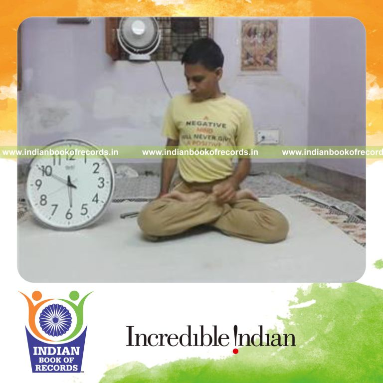 individual holding psychic union yoga pose for longest time for record in Indian Book of Records