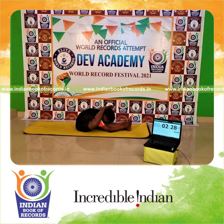 A participant holding the Purna Skandasana yoga pose steadily for an extended duration recognized by Indian Book of Records