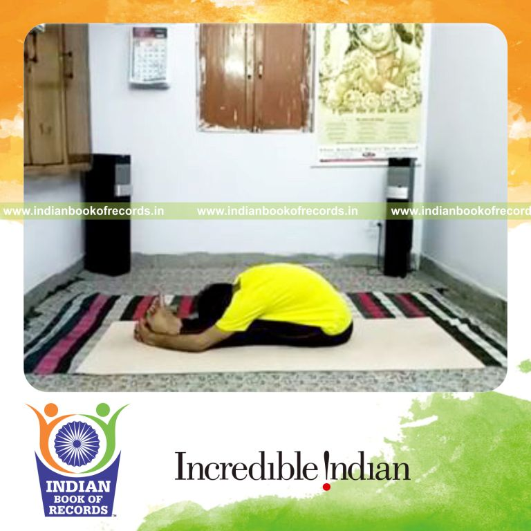 individual holding seated forward bend yoga pose for longest time for record in Indian Book of Records