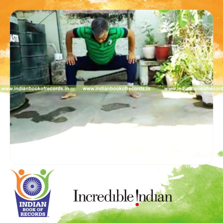 individual holding sumo pose on heels for longest duration record in Indian Book of Records