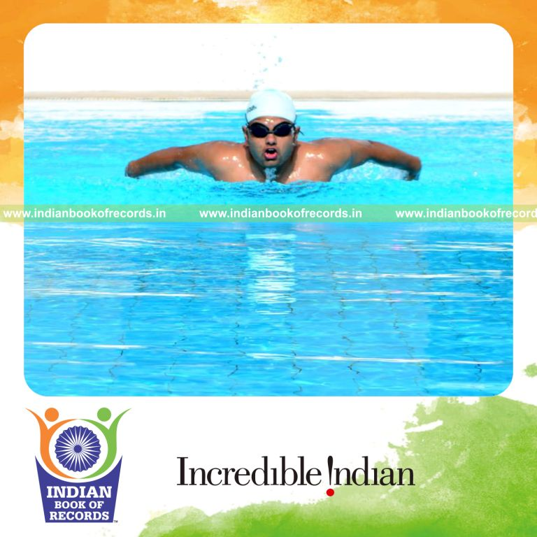 male swimmer performing long distance swimming marathon for Indian Book of Records