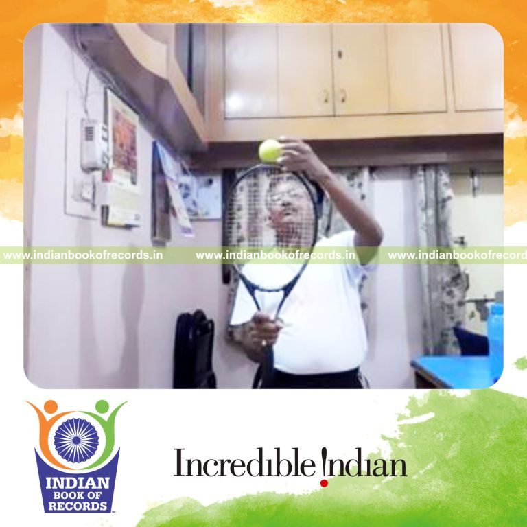 individual balancing tennis ball on spine of racquet for longest duration record in Indian Book of Records