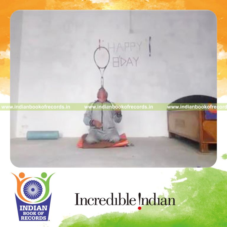 individual balancing tennis racquet on nose while kneeling for longest duration for record in Indian Book of Records