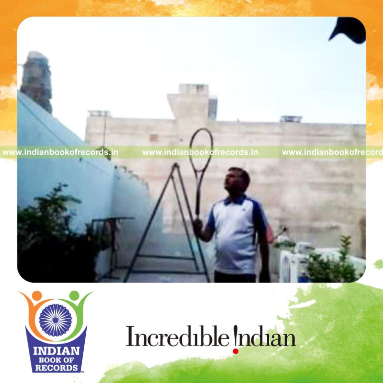 individual balancing tennis racquet on thumb for longest duration record in Indian Book of Records