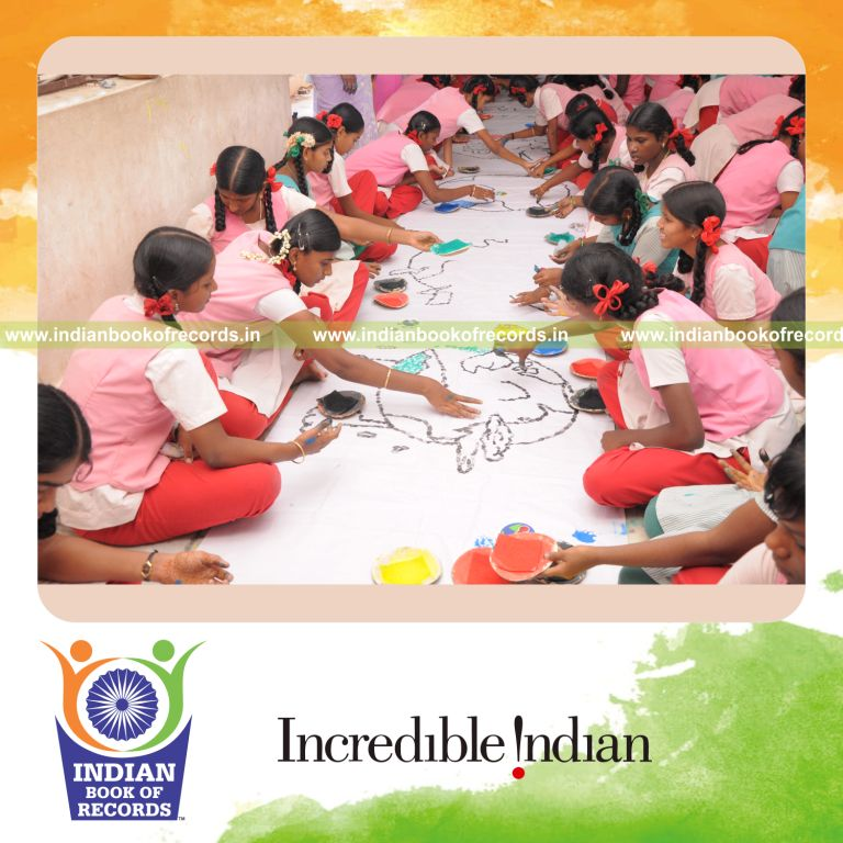 team creating extended thumbprint painting artwork for record in Indian Book of Records