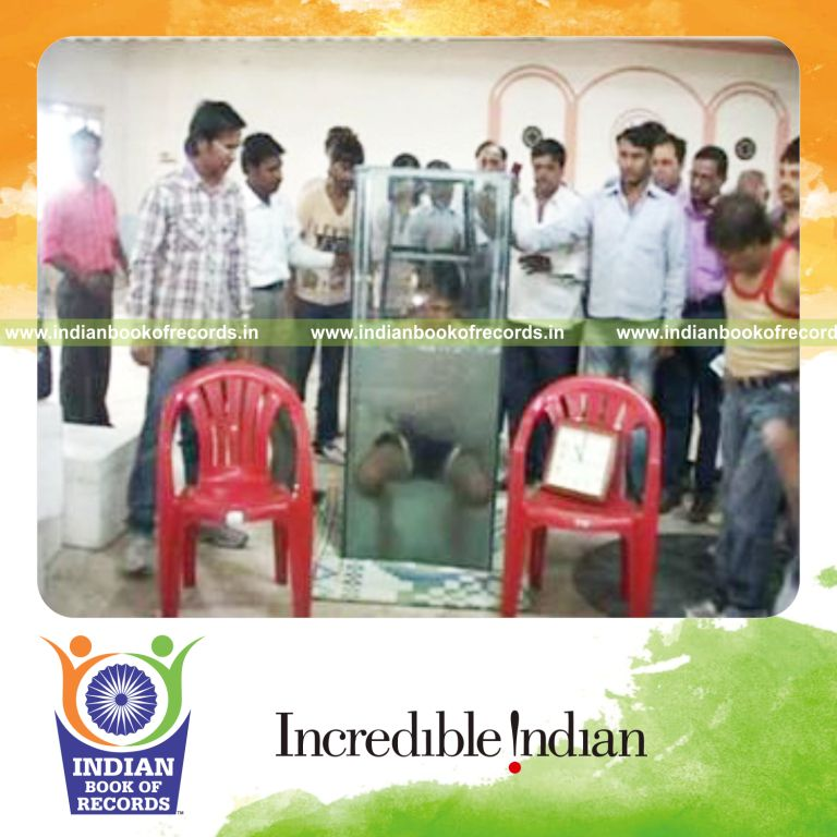 individual staying submerged in ice bath for longest time for record in Indian Book of Records