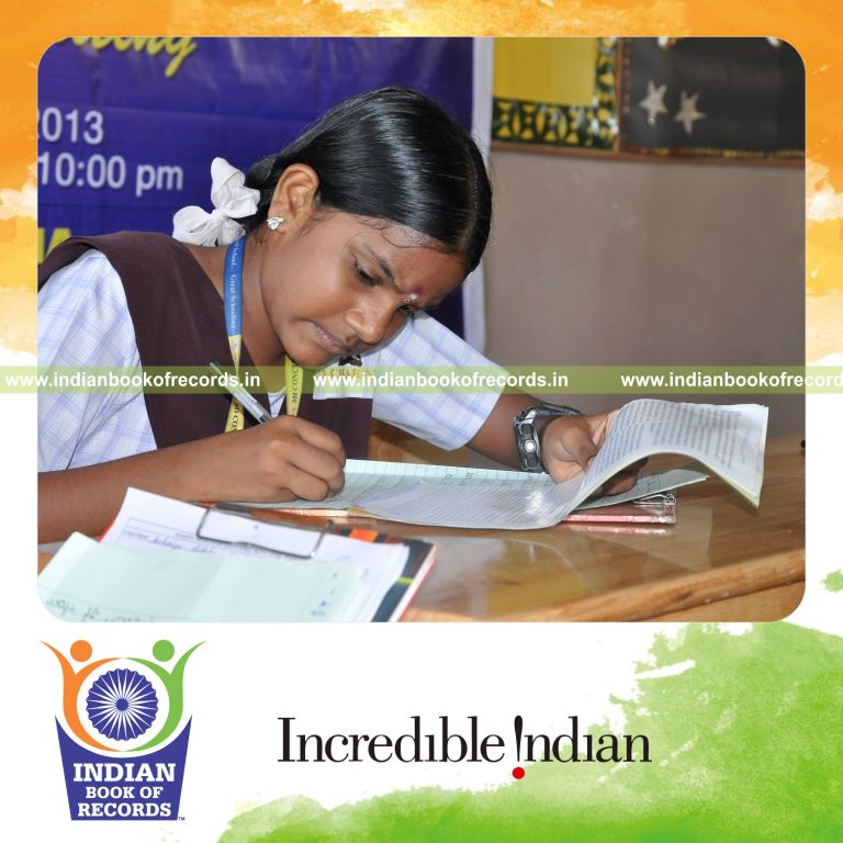young female performing mirror writing for extended time for record in Indian Book of Records