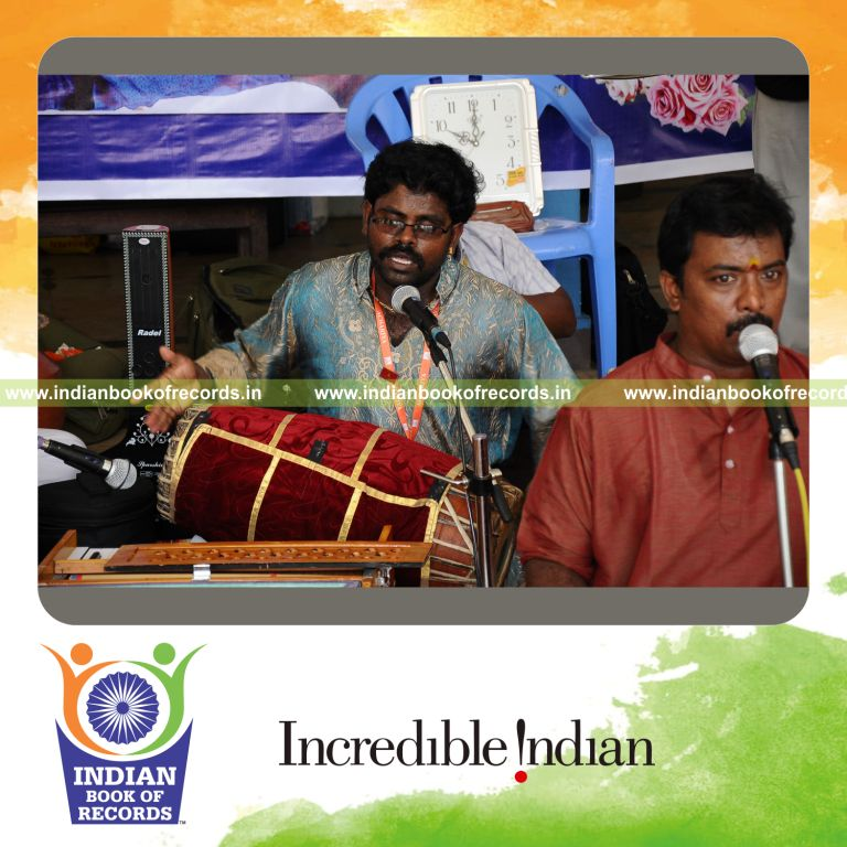 male individual performing multiple musical instruments continuously for record in Indian Book of Records