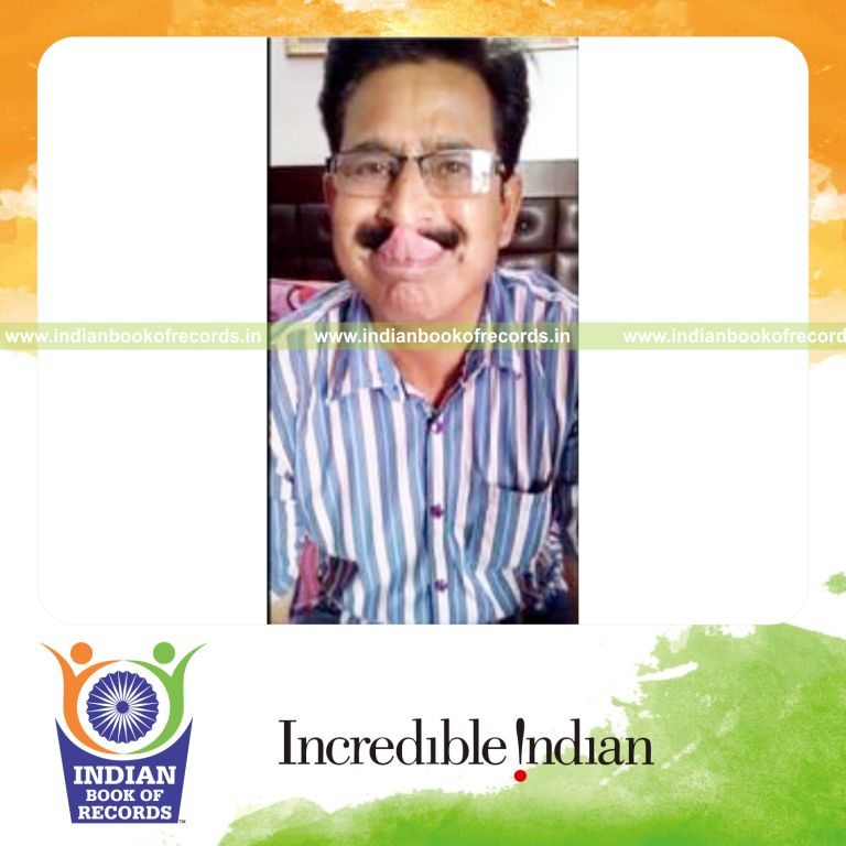 individual touching tongue to nose for longest time for record in Indian Book of Records