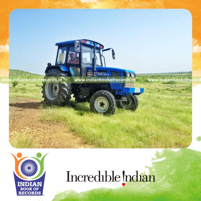 team completing long tractor expedition for record in Indian Book of Records
