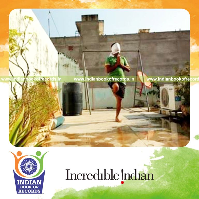 individual holding yoga tree pose blindfolded for longest duration for record in Indian Book of Records