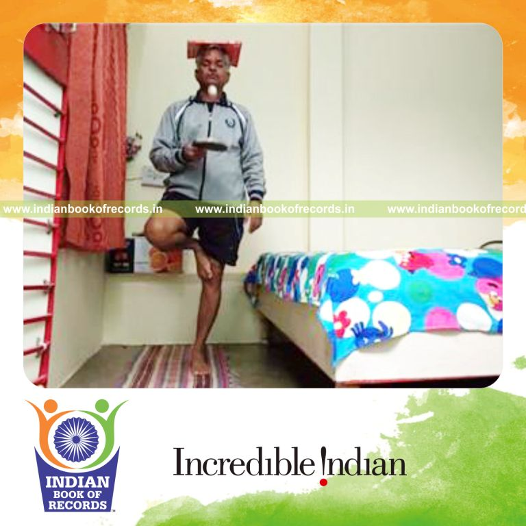individual bouncing table tennis ball while balancing book on head and standing on one foot for record in Indian Book of Records