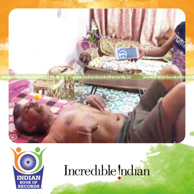 individual hovering table tennis ball above mouth for record in Indian Book of Records