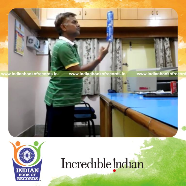 individual balancing two soda cans on fingertip for longest time record in Indian Book of Records