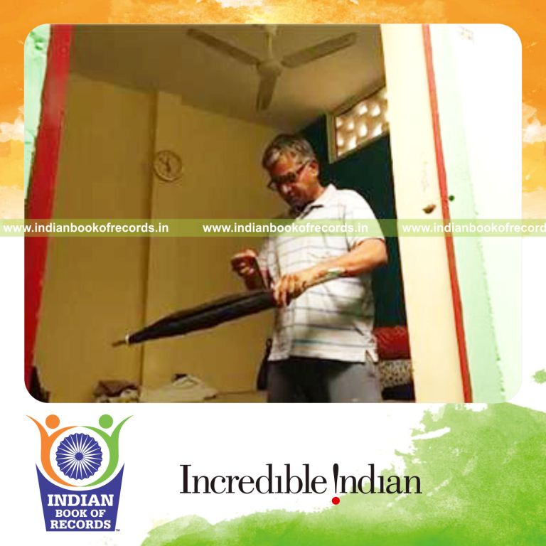individual balancing umbrella on elbow for longest duration for record in Indian Book of Records