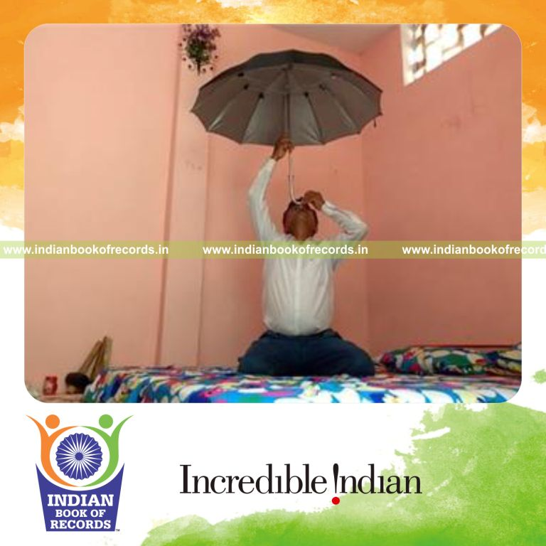 individual balancing umbrella on nose for longest duration for record in Indian Book of Records
