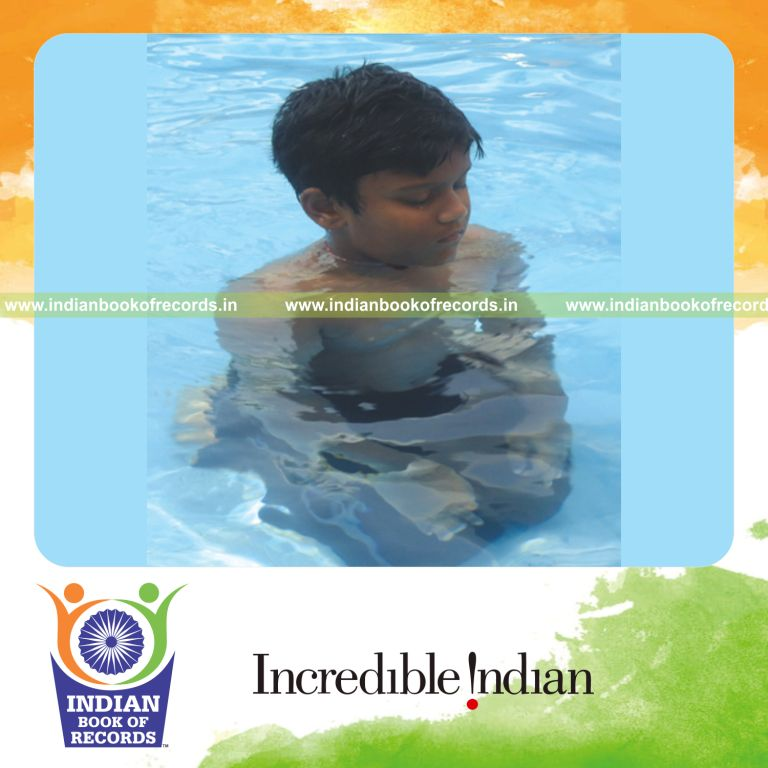 young boy holding vajrasana pose for long duration for Indian Book of Records