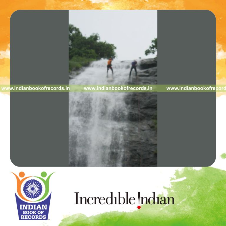 person performing extended water rappelling activity for record in Indian Book of Records