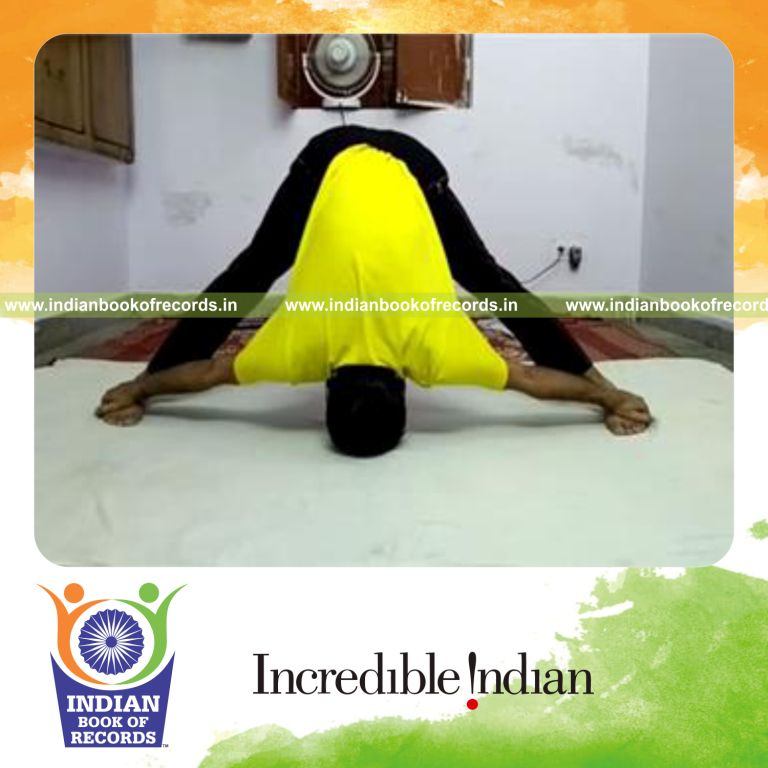 individual holding wide legged forward bend pose for longest duration for record in Indian Book of Records