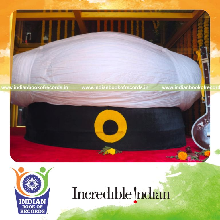 Large replica of Maharashtrian pagdi associated with Sant Tukaram Maharaj recognized by Indian Book of Records