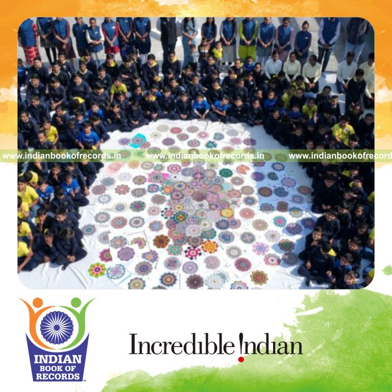 Team creating multiple mandala pattern artworks with intricate designs recognized by Indian Book of Records
