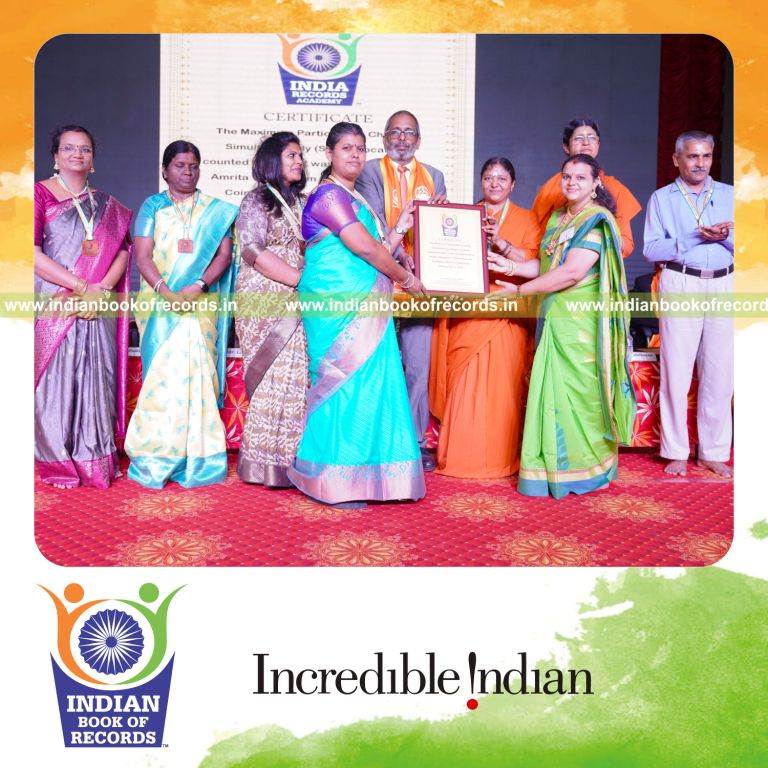 Large gathering of participants chanting together in unison at a single location for Indian Book of Records