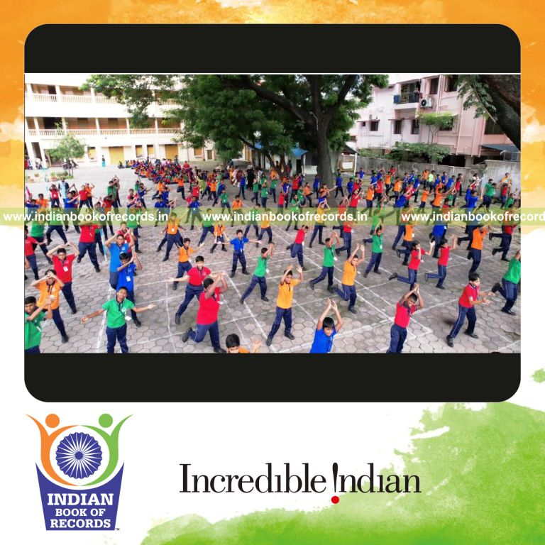 Crowd of dancers performing energetic hip hop moves simultaneously at a single venue for Indian Book of Records