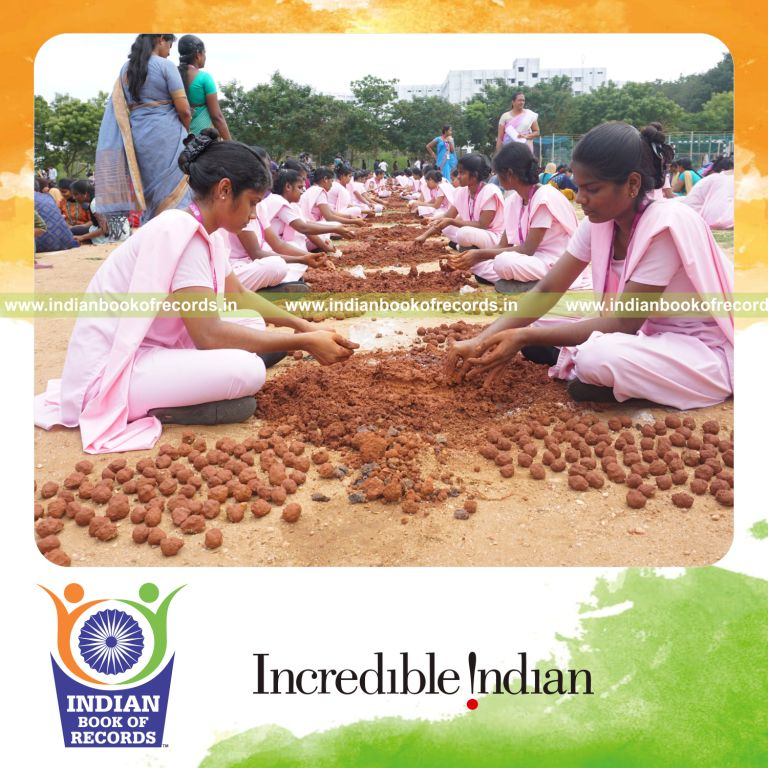 Participants creating seed balls together in large numbers within a limited time at one venue for Indian Book of Records