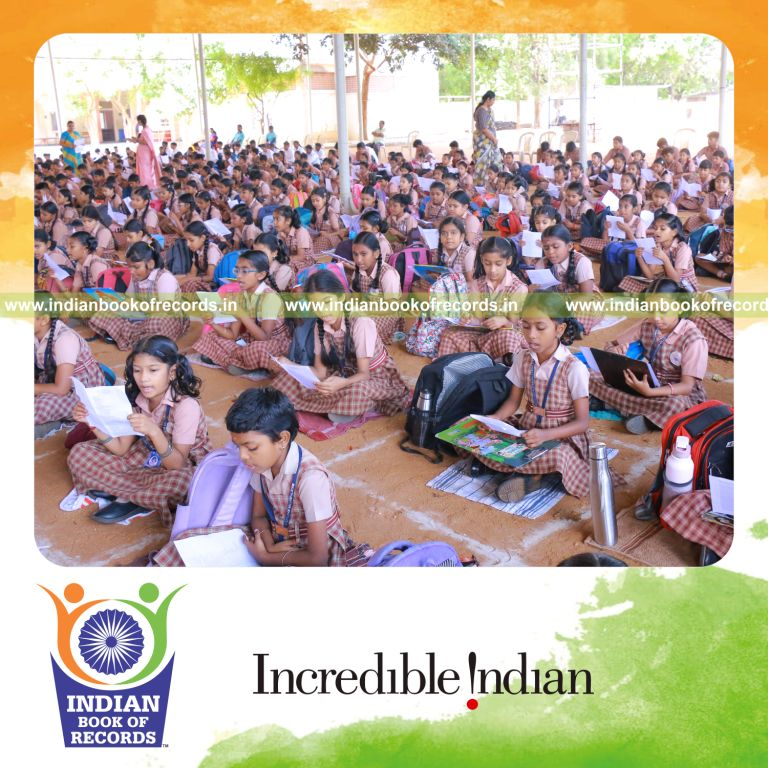 Participants collectively reading shlokas aloud together at one venue for Indian Book of Records