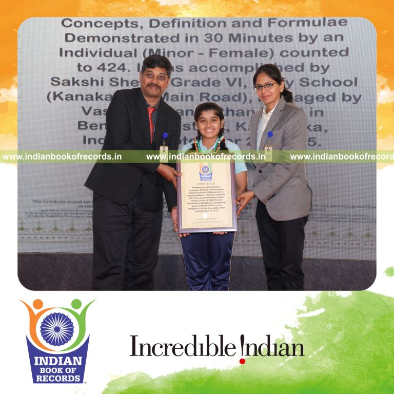 Young girl demonstrating multiple mathematical concepts and formulas rapidly recognized by Indian Book of Records