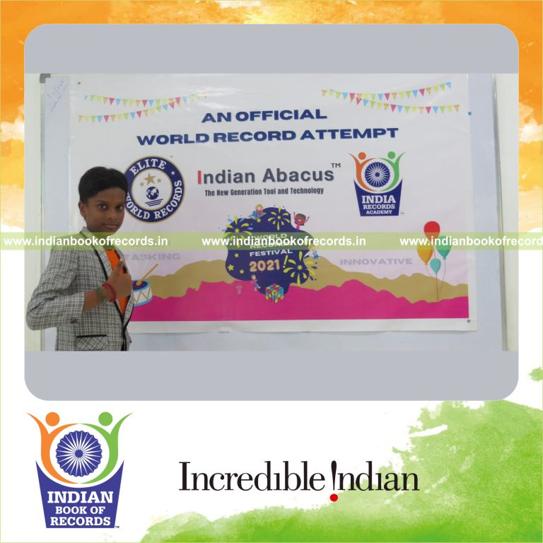 individual male solving arithmetic problems while performing silambam simultaneously for Indian Book of Records