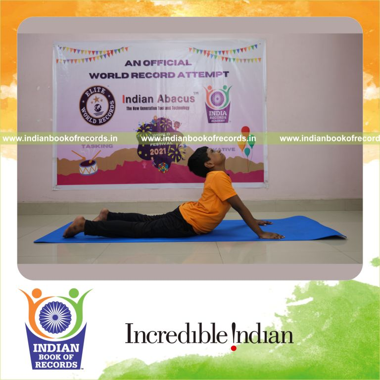individual male solving arithmetic problems while performing surya namaskaras for Indian Book of Records