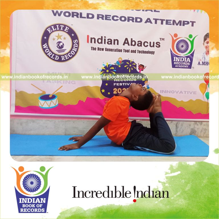 individual male solving arithmetic problems while performing yoga simultaneously for Indian Book of Records