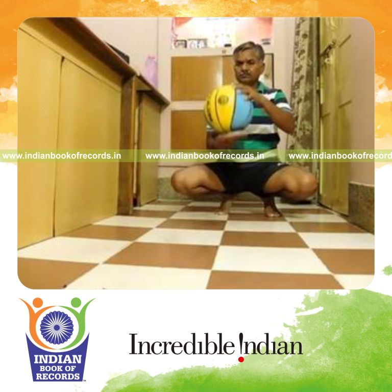 individual bouncing basketball on alternate paddle sides while sitting on toes for record in Indian Book of Records
