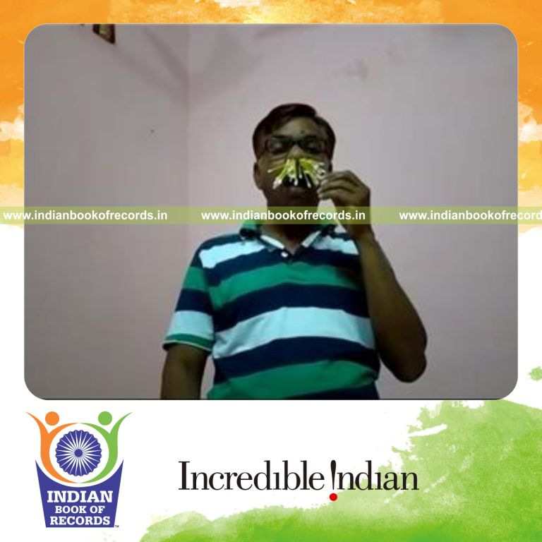 individual fitting cotton buds into nostrils for record in Indian Book of Records