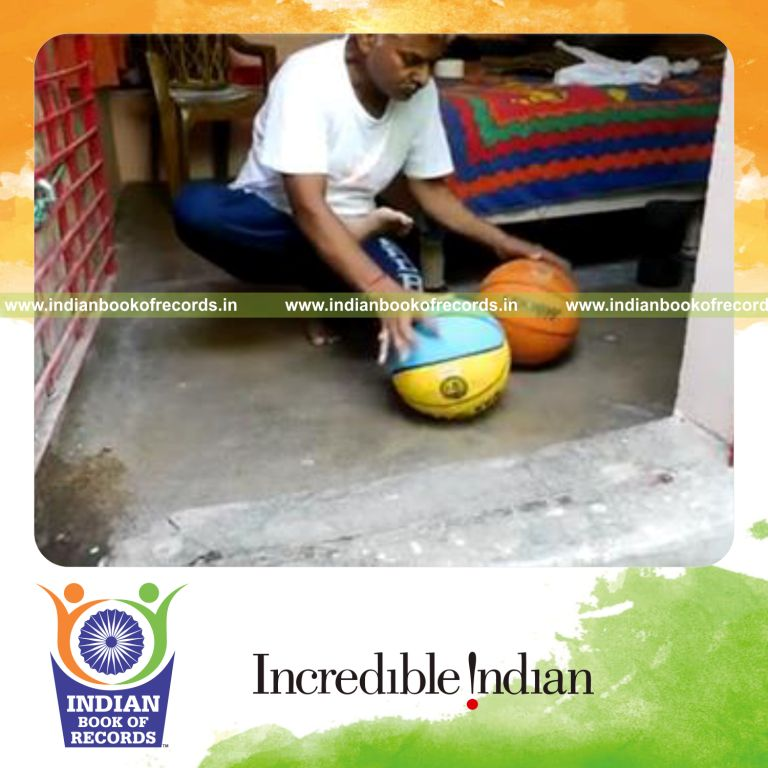 individual dribbling two basketballs consecutively while sitting on toes for record in Indian Book of Records