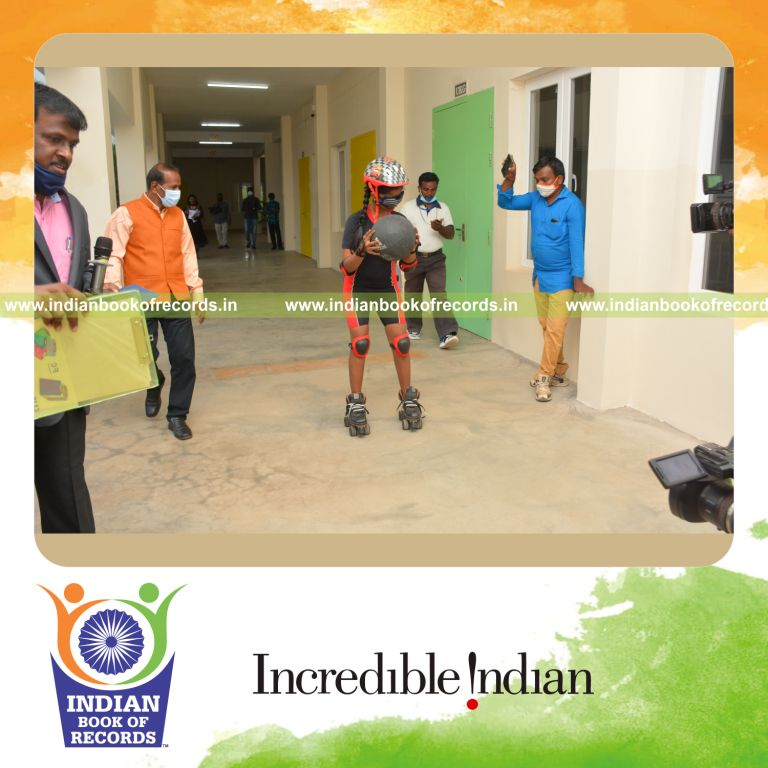 individual female dribbling ball while skating blindfolded for Indian Book of Records