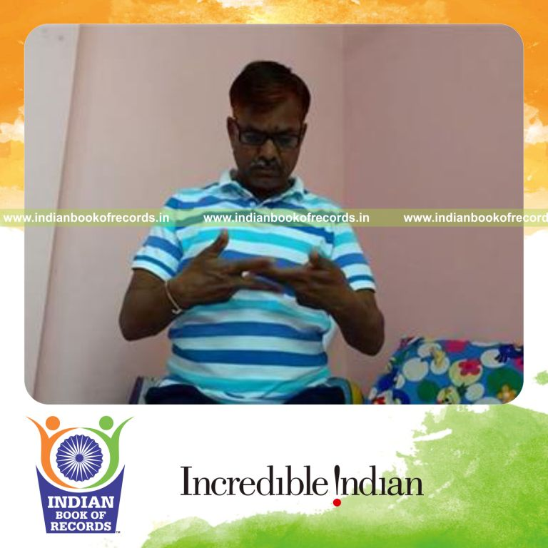 individual performing finger scissors in 10 seconds for record in Indian Book of Records