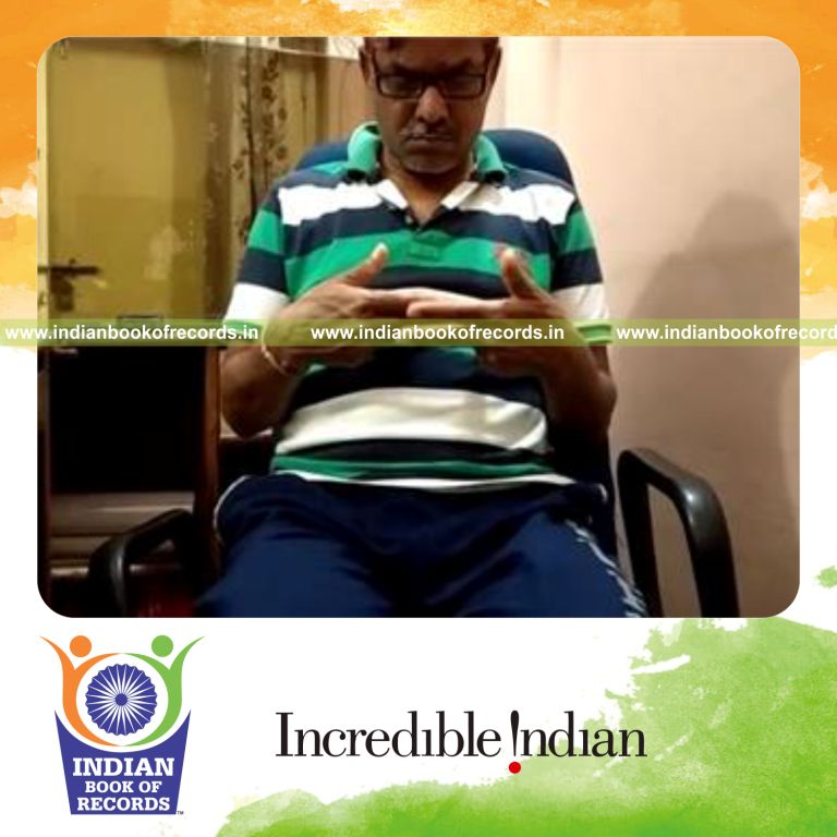 individual performing finger scissors in 30 seconds for record in Indian Book of Records