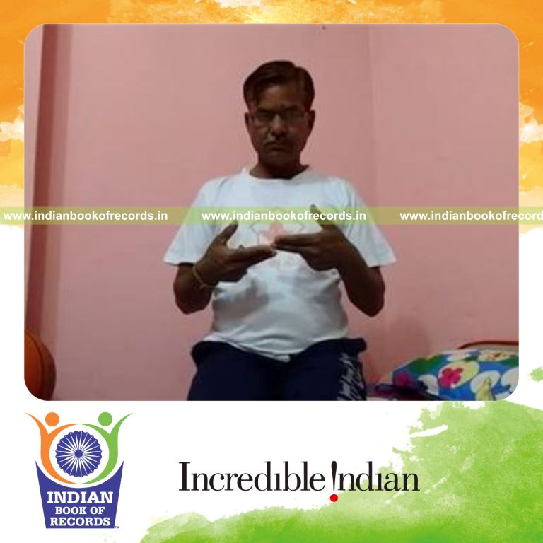 individual performing finger scissors in five minutes for record in Indian Book of Records